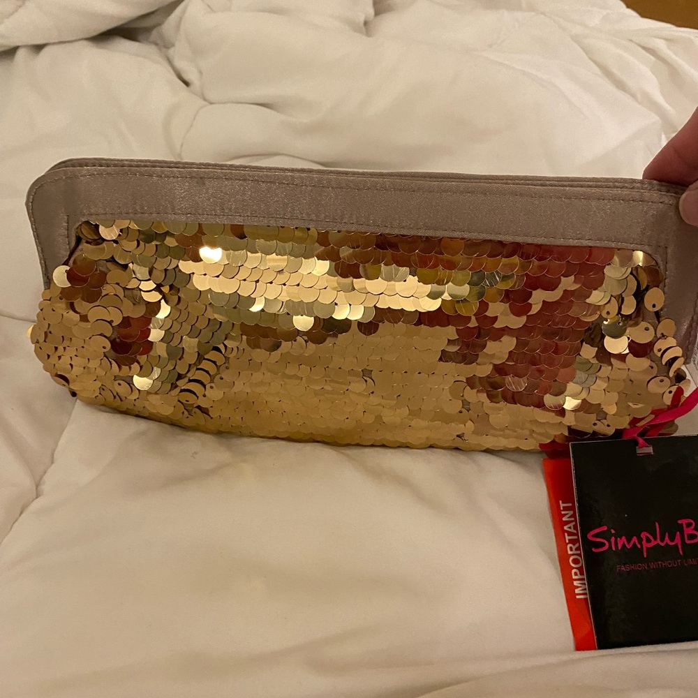 NWT simply be brand gold sequin clutch. Has gold chain strap with it
